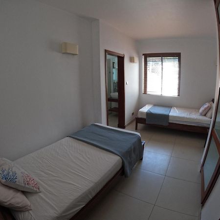 Olana Blue - Beachfront Apartment Riviere Noire Luaran gambar